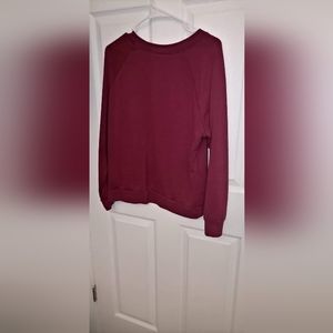 Dark red sweater